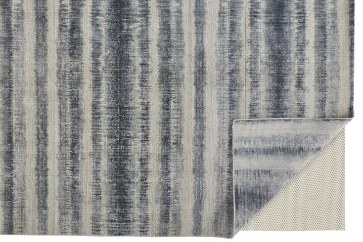 8' x 10' Ivory and Blue Abstract Hand Woven Area Rug