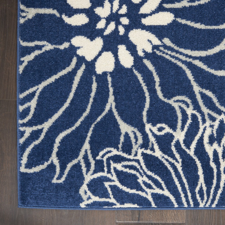 8' x 10' Blue & Ivory Floral Power Loom Polypropylene Area Rug