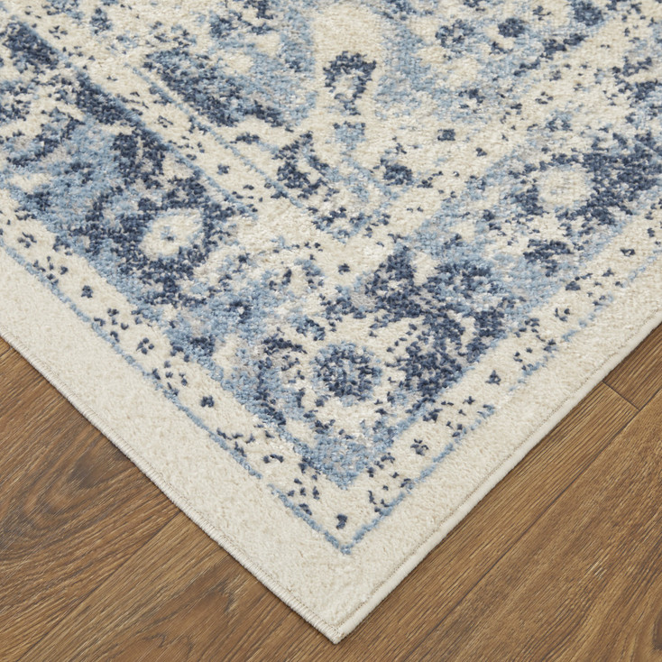 8' x 10' Ivory and Blue Floral Power Loom Distressed Area Rug