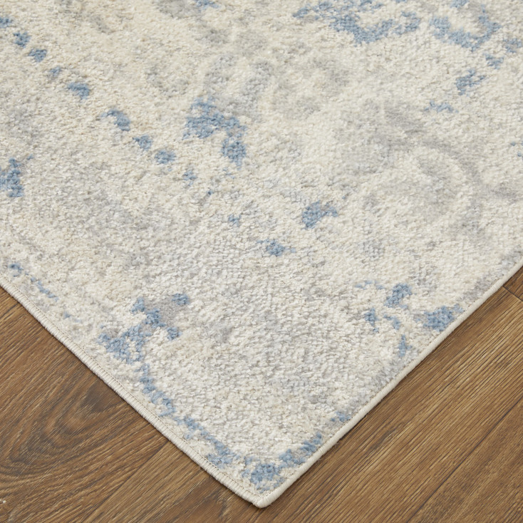 8' x 10' Blue and Ivory Power Loom Distressed Area Rug