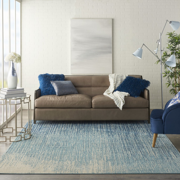 8' x 10' Ivory & Blue Abstract Power Loom Area Rug