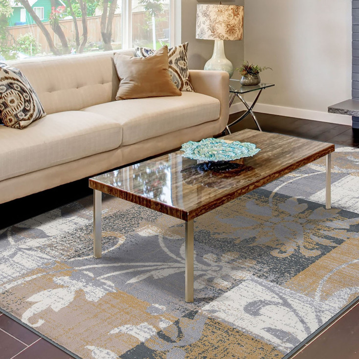 8' x 10' Beige and Gray Floral Power Loom Distressed Stain Resistant Area Rug
