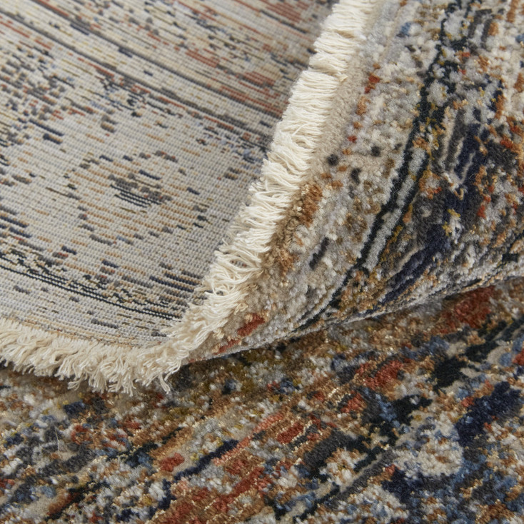 8' x 10' Tan Orange and Blue Floral Power Loom Distressed Area Rug with Fringe