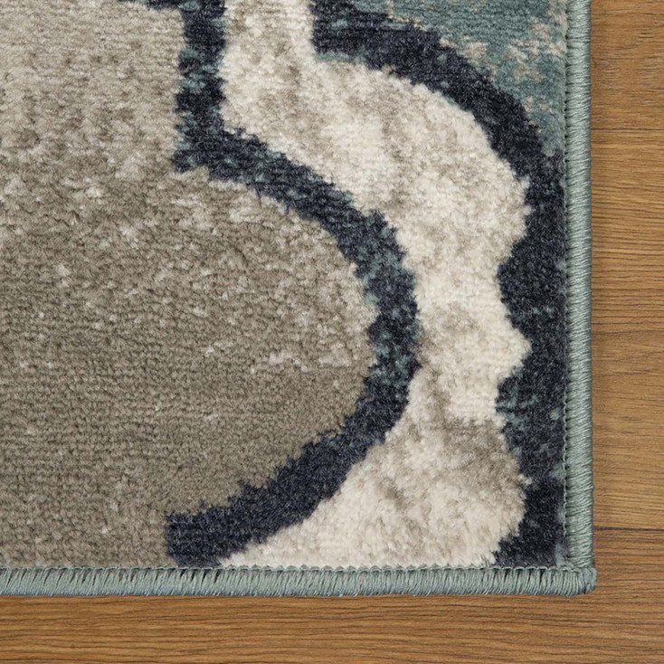 8' x 10' Deep Royal Quatrefoil Power Loom Distressed Stain Resistant Area Rug