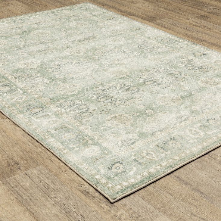 8' x 10' Green and Ivory Oriental Power Loom Stain Resistant Area Rug