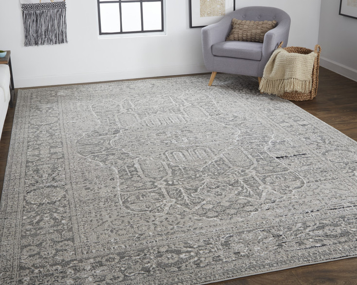 8' x 11' Gray Silver and Taupe Floral Power Loom Distressed Area Rug