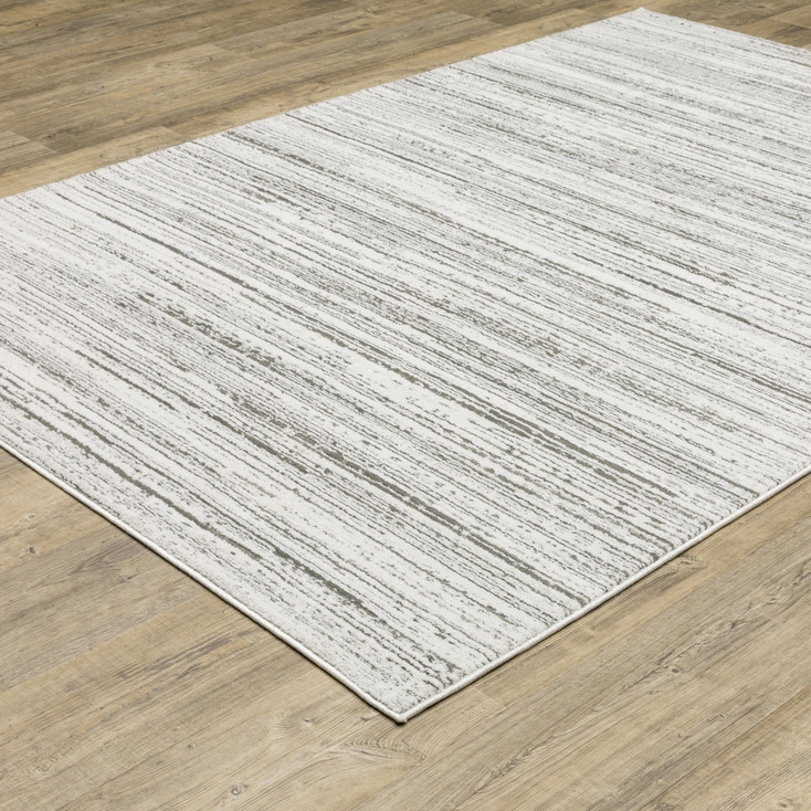 8' x 11' White and Grey Abstract Power Loom Stain Resistant Area Rug