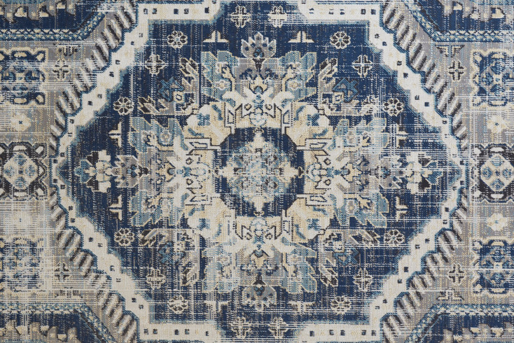 8' x 11' Blue and Ivory Abstract Power Loom Distressed Stain Resistant Area Rug