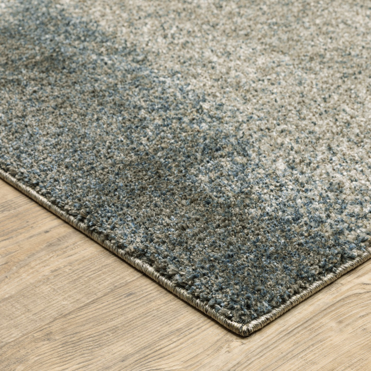 8' x 11' Grey and Teal Blue Abstract Power Loom Stain Resistant Area Rug