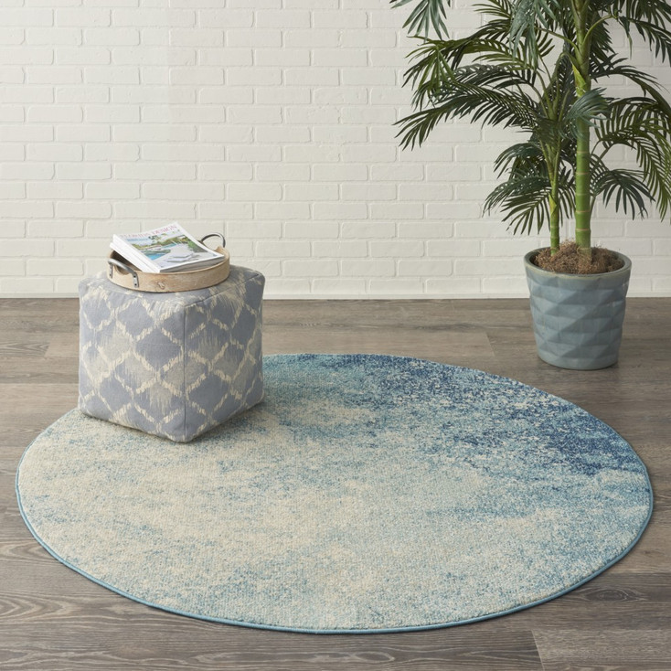 5' Ivory and Blue Round Abstract Power Loom Area Rug
