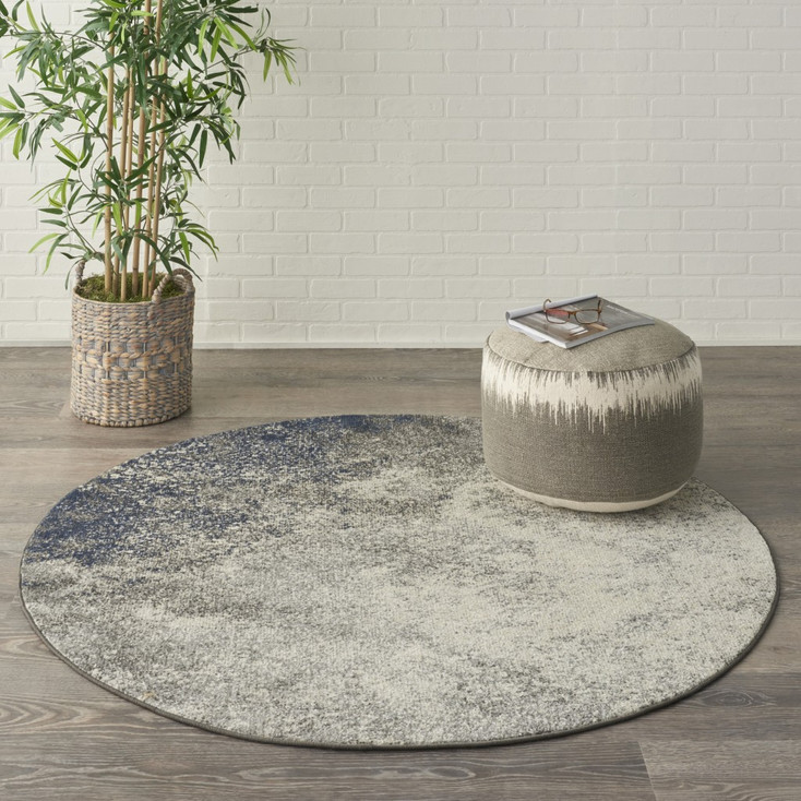 5' Gray and Ivory Round Abstract Power Loom Area Rug