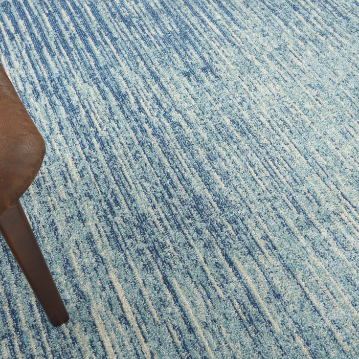8' Ivory & Blue Round Abstract Power Loom Area Rug
