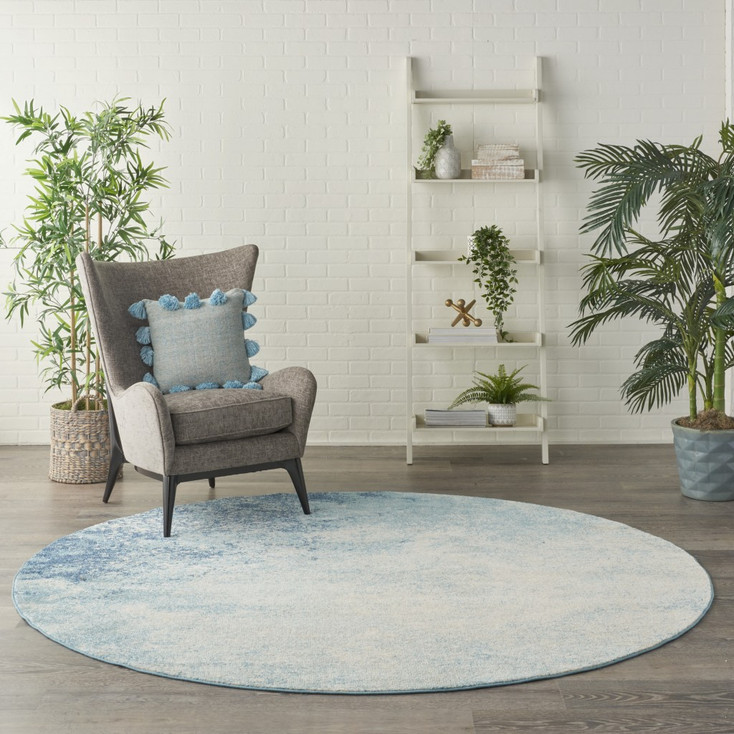 8' Ivory and Blue Round Abstract Power Loom Area Rug