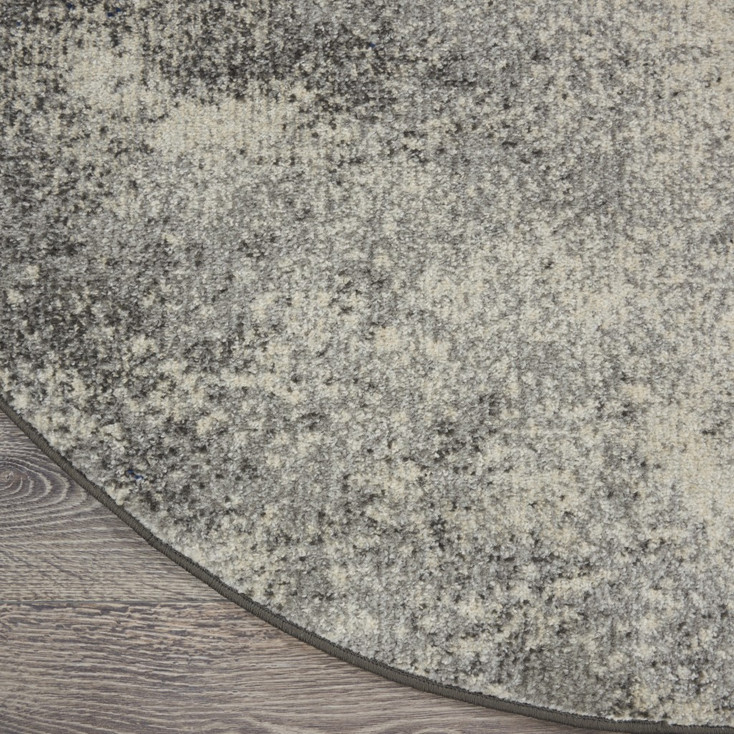 8' Gray and Ivory Round Abstract Power Loom Area Rug