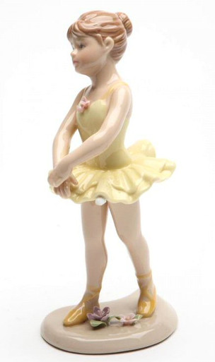 Young Ballerina in Yellow Standing Porcelain Sculpture - Cosmos