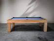 Side profile of Paula Parsons pool table showing sleek contemporary design and maple finish