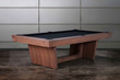 Three-quarter view of the Doc & Holliday Kaci pool table in Grey Walnut photographed in a minimalist studio setting