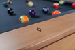 Detail view of the maple rail on the Doc & Holliday Preakness pool table with mother-of-pearl diamond sights.