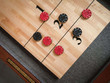 Close-up of maple butcher block shuffleboard playfield with scoring lines