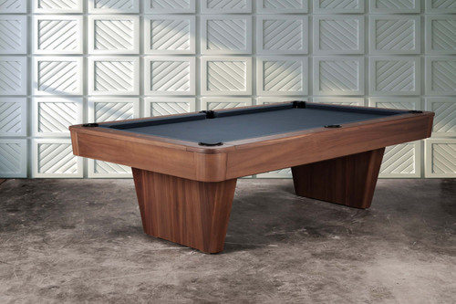 Three-quarter angle view of the Doc & Holliday Preakness pool table in Grey Walnut, highlighting the pedestal base and rail profile.