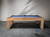 Side profile of Paula Parsons pool table showing sleek contemporary design and maple finish