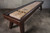 Solid wood leg detail on George shuffleboard table in Antique Coffee finish