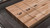 Plank & Hide Co McCormick Shuffleboard Table by Plank & Hide | Installation Shuffleboard Table – 3/4 perspective view