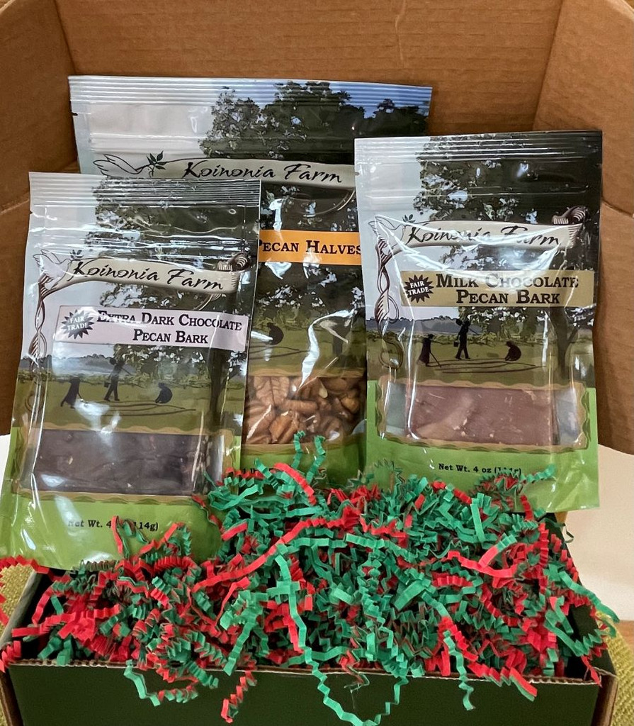 The open 7-item Gift Box shows red and green crinkled paper to match the occasion