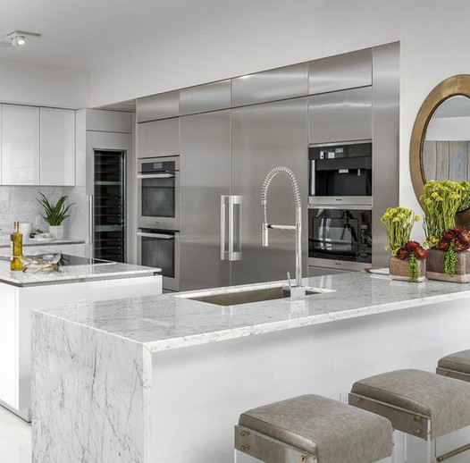 Is Carrara marble good for kitchen countertops?