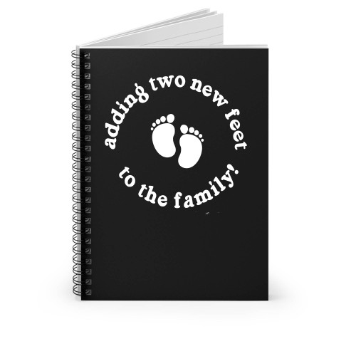 Adding Two New Feet To The Family Spiral Notebook