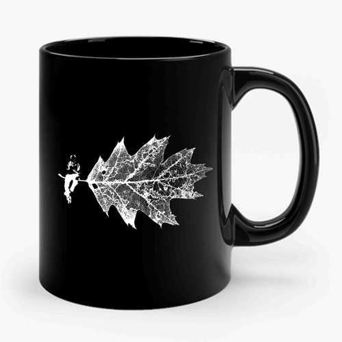 Man On A Leaf Ceramic Mug