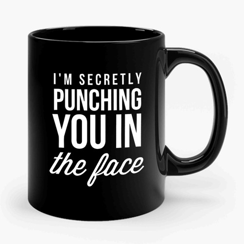 im secretly punching Ceramic Mug