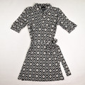 This black and tan dress, size S Maternity, was made exclusively for A Pea in the Pod by Laundry by Shelli Segal.