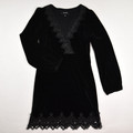 This black velvet dress with lace trim is a size M, by 4S13NNA.