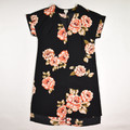 This black dress with orange flowers has a deep V-neck, is a size S, and is by A New Day.