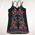 This black floral sundress by Xhilaration has spaghetti strap sleeves, and is a size L.