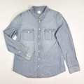 This denim style button up shirt by J. Crew is a size M.