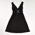 This black short cocktail style dress by American City Wear is a Size S.