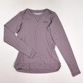 This is a lavender long sleeve activewear shirt by Dakine, Size M.