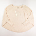 This is an ivory, poncho style sweater by Lauren Conrad, Size L.