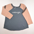 This is a grey and tan sweatshirt with California 79 on the front, by Free People, Size L.
