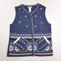 This is a blue sweater vest with snowflakes and mitten pockets, size XL, by Classic Elements.