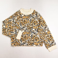 This is a cream, gold and black sweater by Rachel Comey, Size S.