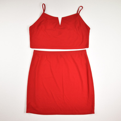 This set by Shein Curve is a size 2XL, with a red skirt and a red spaghetti strap cropped top.