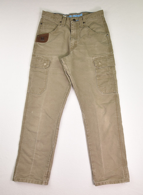 This is a pair of tan Riggs Workwear Cool Vantage Jeans by Wrangler, Size 30 x 32. This is a pair of tan Riggs Workwear Cool Vantage Jeans by Wrangler, Size 30 x 32.