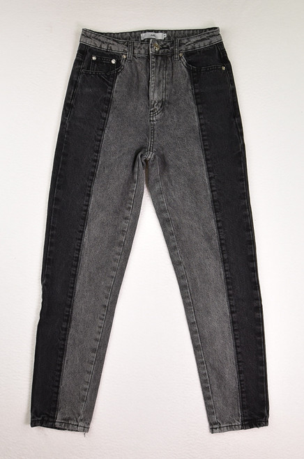 This is a pair of grey and black skinny jeans, size S, by Adika.