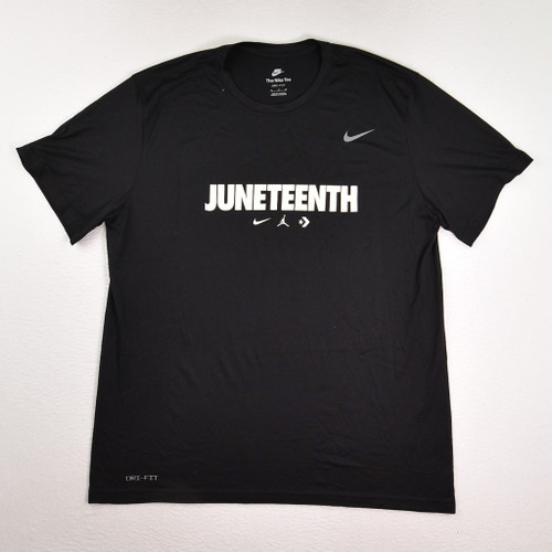 This black Juneteenth Nike short sleeve shirt is a size XL.