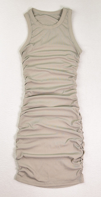 This grey knit dress is sleeveless, and has ruched sides, size XS.