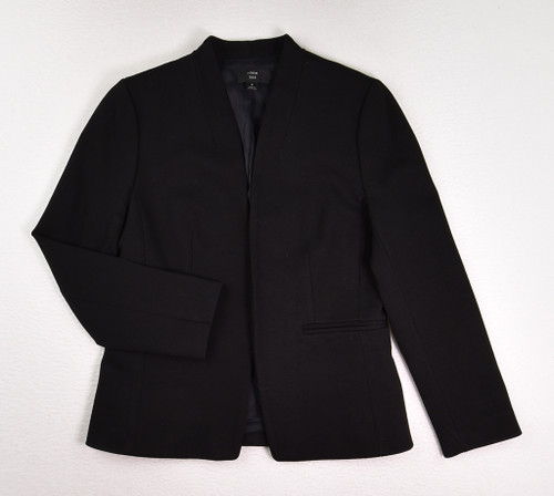 This is a black, lined knit blazer by J. Crew, size 8. This is a black, lined knit blazer by J. Crew, size 8.
