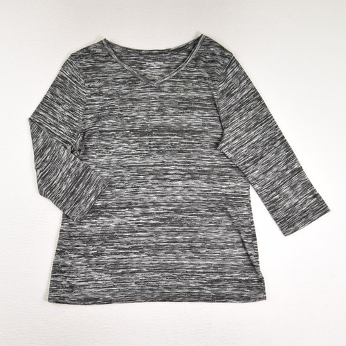 This is a black and white, 3/4 length sleeve knit shirt by Studio Works, Size M.